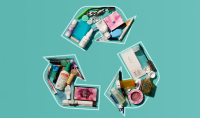 beauty products in the shape of a universal recycling symbol