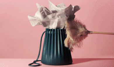 cleaning purse with a feather duster