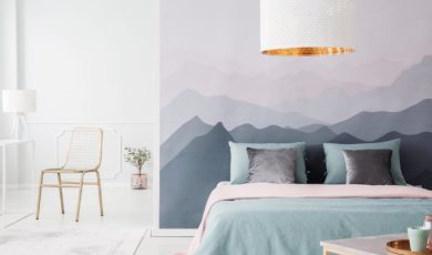 bedroom with bed and mural